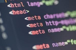 Html Meta Tag Code On Computer Screen to improve SEO