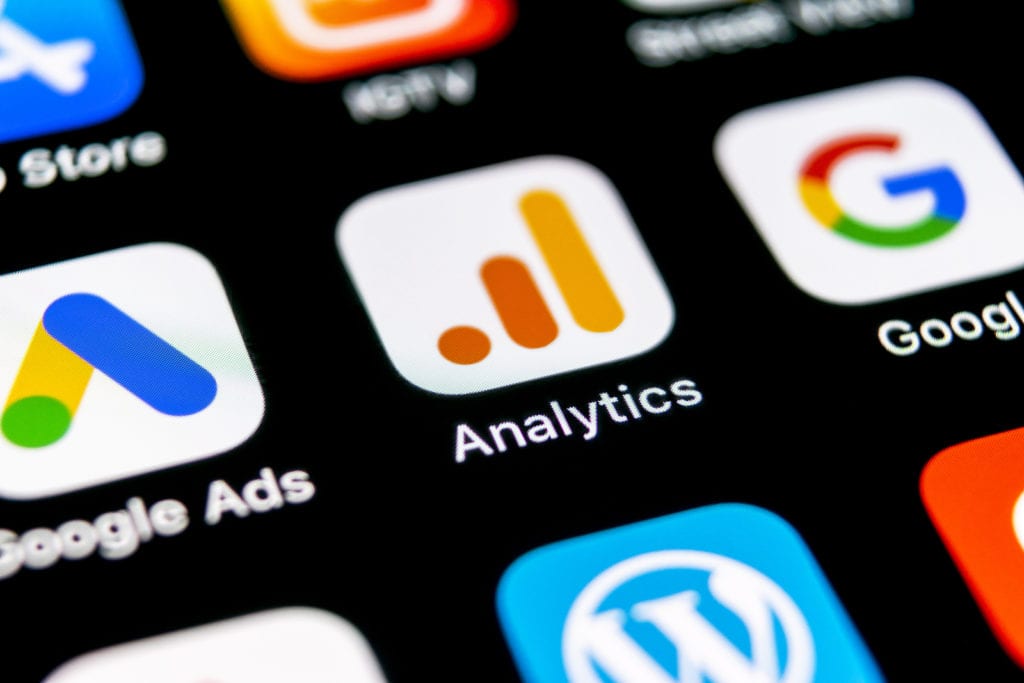 Google Analytics and Google Ads apps on mobile device screen